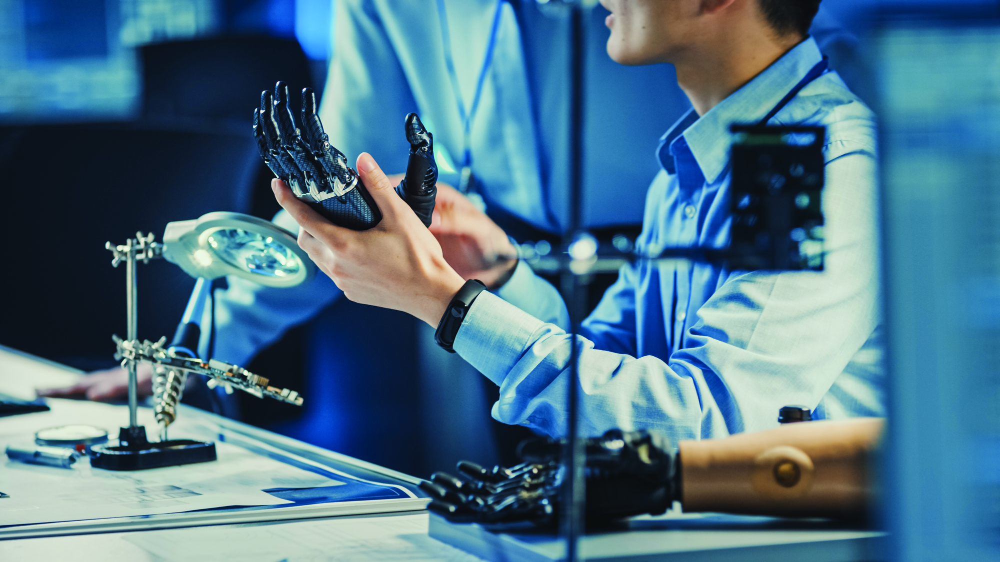 Man holding bionic arm